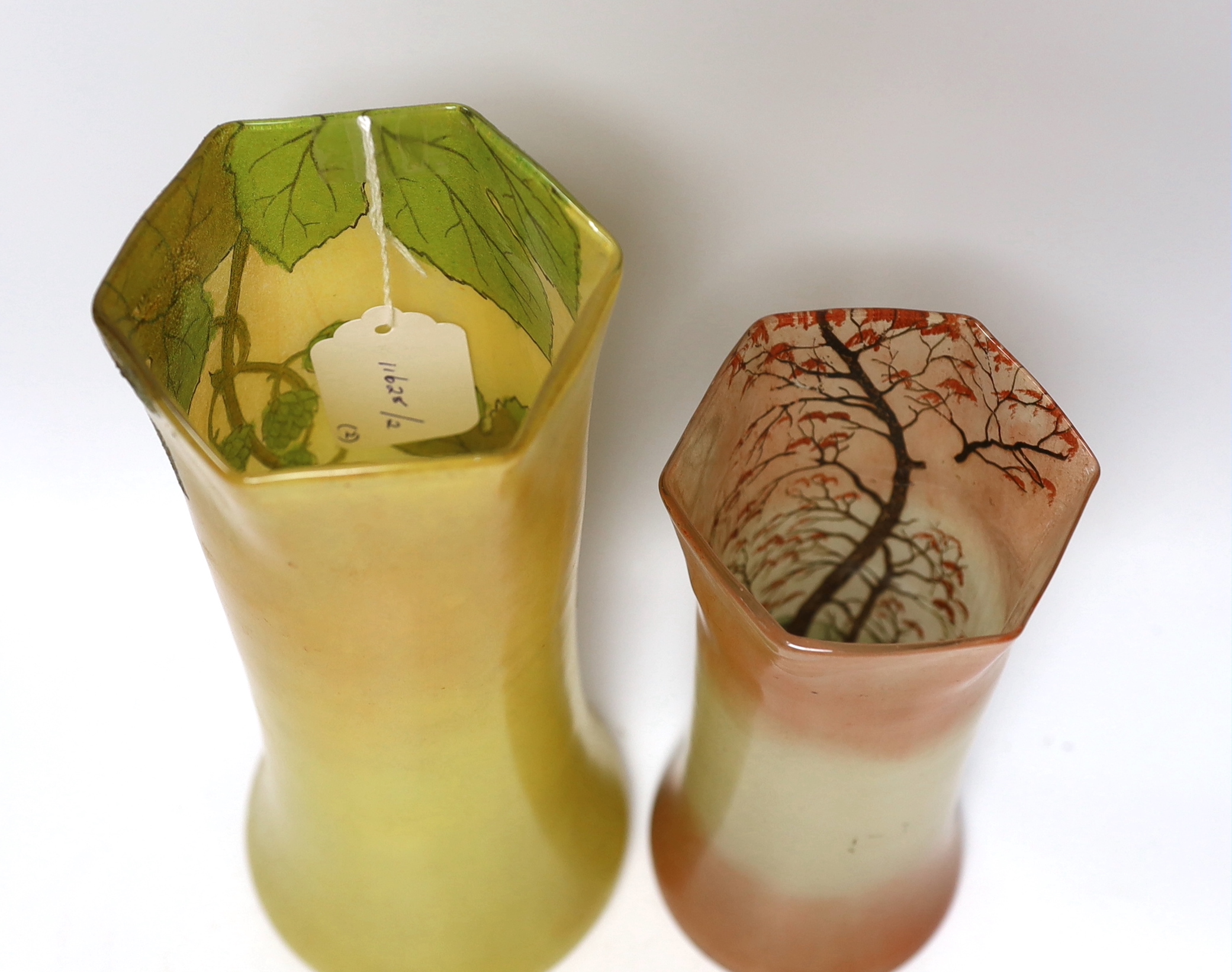 Two early 20th century French enamelled glass vases, 29cm